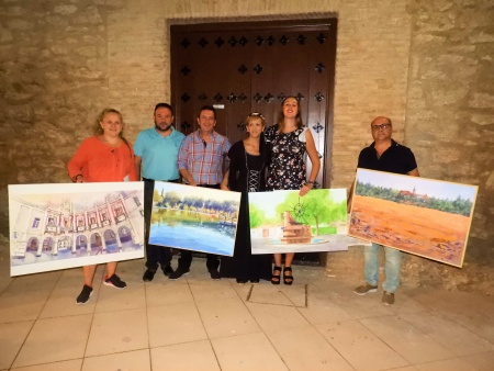 Silvia Cebrián y Juan López de Pablo, junto a los ganadores en el Certamen de Pintura