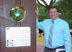 Dr. Julián Gómez Cambronero next to Earth's monolith